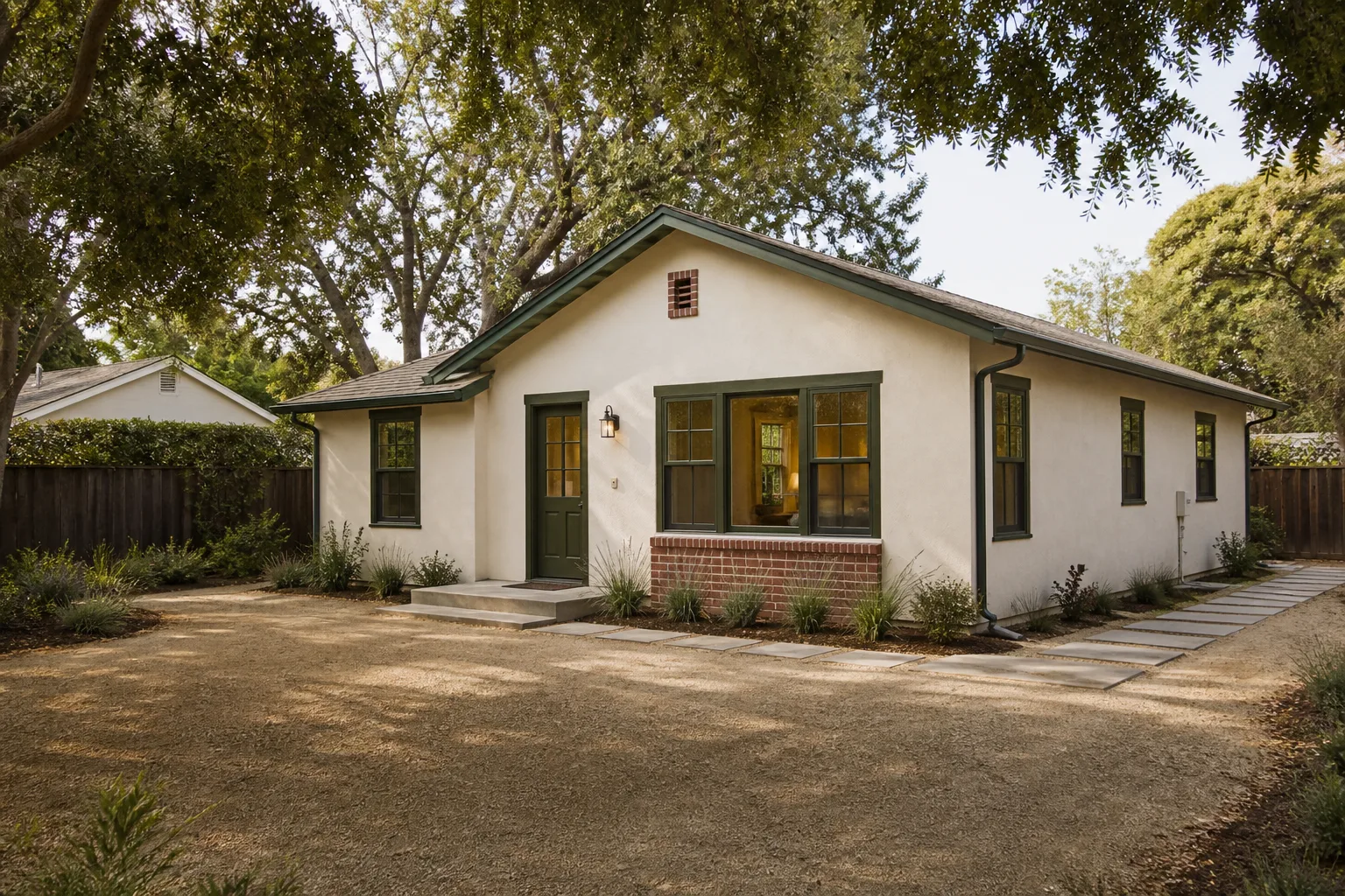 Architectural visualization of a detached backyard ADU beneath mature trees