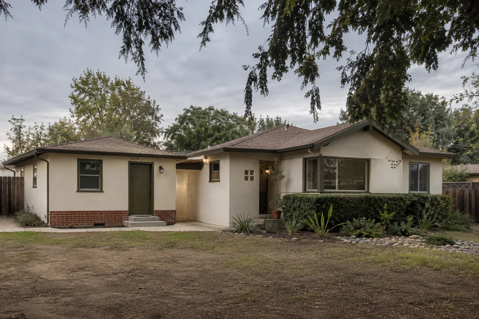 Architectural visualization of an attached ADU addition connected to an existing home
